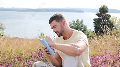 Author writing around inspiring nature