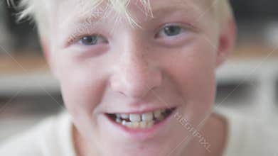 The video shows a young boys charming expressions and joyful smiles