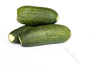 Fresh Whole Cucumbers on White Background