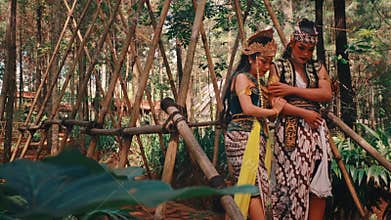 Javanese Couple Leaving a Bamboo Structure in the Forest