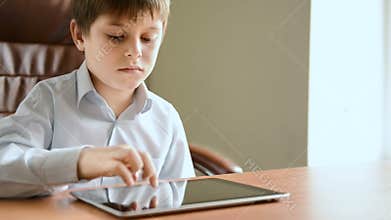 Child with tablet computer
