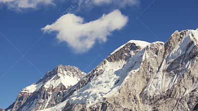 Early Morning View of Snow-Capped Mountains in Nepal, Featuring a Heart-Shaped Cloud