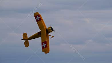 Bucker Bu 133 Jungmeister RC model performing aerobatic maneuvers