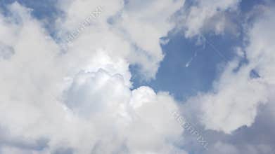 view of cumulonimbus clouds in a blue sky