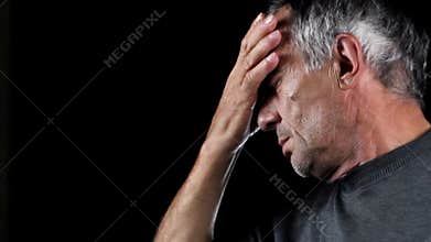 Senior man with headache