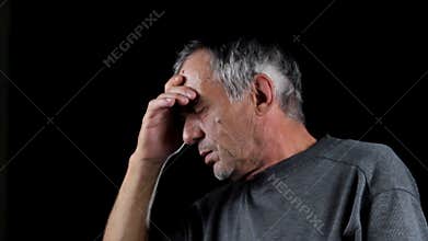 Senior man with headache