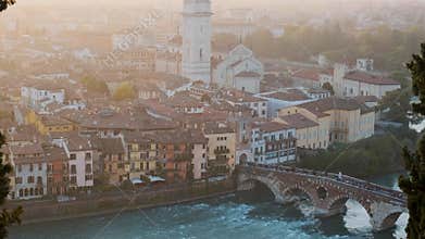Aerial view of Verona old town on Adige river with Ponte Pietra bridge, bell tower of Verona Cathedral, medieval