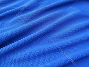 Abstrack blue silk satin texture background. Beautiful wavy soft folds on the surface of the fabric.