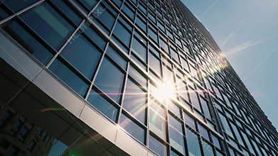 Modern Glass Building Exterior Footage with Reflections and Sunlight