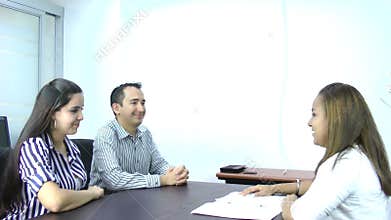 Couple signing financial contract