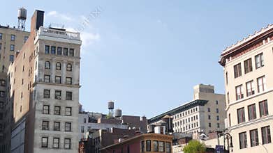 New York City Broadway, Manhattan midtown Union Square building architecture. Rooftop water tower.