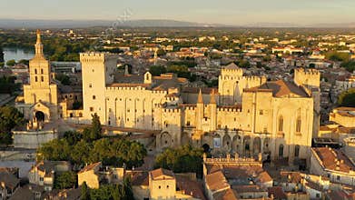 View of Avignon with Palais des Papes during sunset in Southern France. Medieval architecture along the Rhone River in Avignon,