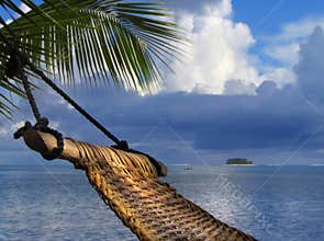 Hammock on tropical beach
