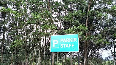 special parking lot for staffs and workers signboard on the road in malaysia.