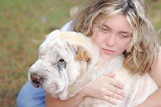 Girl depressed white dog