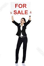 Real estate woman holding for sale sign