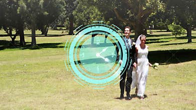 Clock animation over newlywed couple walking in park