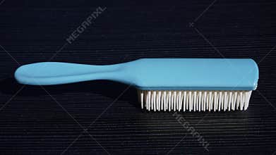blue and white women& x27;s and men& x27;s hair comb