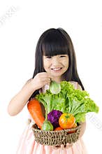Young asian cute girl with vegetable