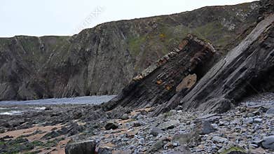 Coloured layers of rock formation in the cliffs at Hartland Quay