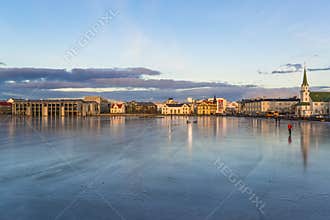 Frozen lake Tjornin in Reykjavik , Iceland