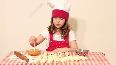 Little girl cook make rolls