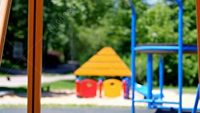 Empty colorful children playground structure park sunny day no people waiting stock footage Generative AI