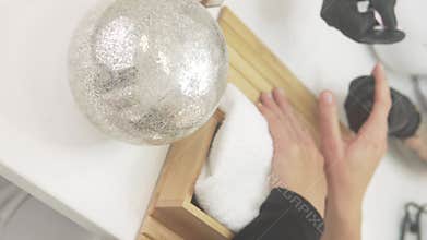 A woman came for a nail manicure in a beauty salon, close-up of her hands