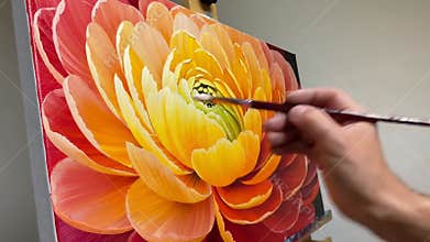 Artist hand painting vibrant yellow orange flower canvas art creativity close stock footage Generative AI