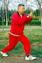 Old man play Taiji boxing