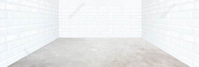 White brick tile room with cement floor