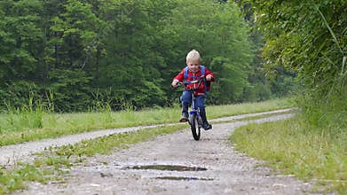 Crossing A Puddle With The Bike