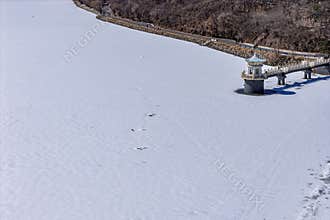 Early Spring Snow - Water Release Tower Landscape at Jingyuetan National Forest Park, Changchun, China