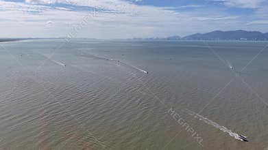 Aerial drone view of fishermen and boats at Kuala Muda Penaga
