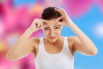 Woman removing vesicle