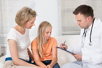 Doctor child patient and mother