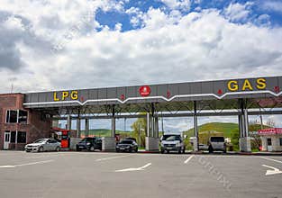 Modern fuel station with LPG and gas signage