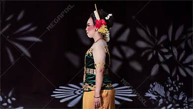 Side Profile of Javanese Traditional Bridal Makeup with Elegant Cultural Costume
