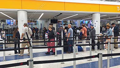 USA, March 31, 2026, Travelers Waiting In Denver Airport Security Line, Editorial terminal video frame with TSA