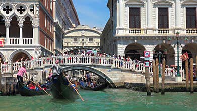 Gondola glides through Venice canal with romantic travel mood classic water transport detail, boat, along, carries, venetian