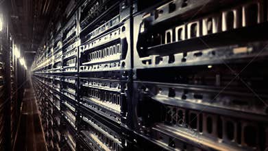 Rows of server racks filling a data center