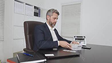 Banker counting money in office. Financial control. Money operation in bank office. Business man in money counting process. Banker