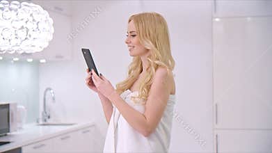 Blond Girl Using Her Tablet Device