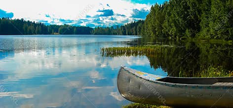 Swedish lake with canoe