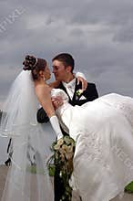 Wedding hot couple having fan