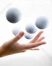 Hand with golf-ball