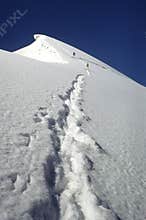 Mountaineers climbing up to the summit
