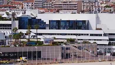 Aerial view of Palais des Festivals in Cannes with seafront quay