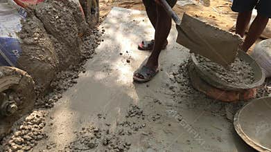 Workers Mixing Cement Concrete on Site, Construction Labor Manual Work Building Process, India