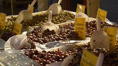 French food market selling marinated olives